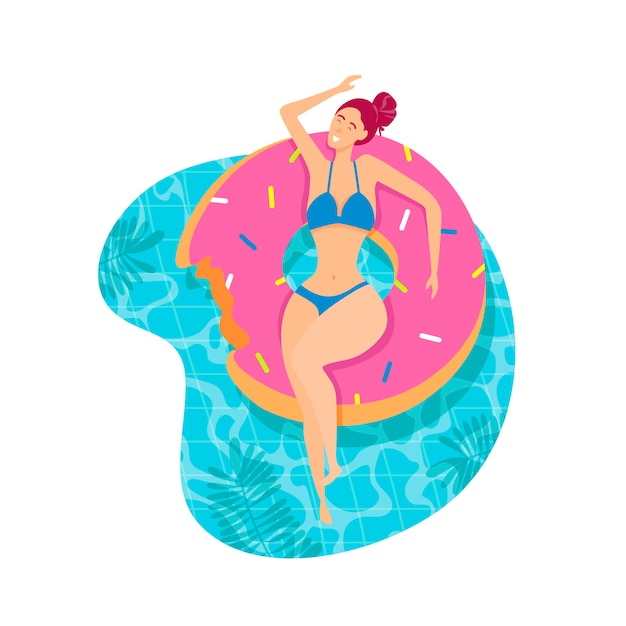 Menina bonita no flutuador de piscina inflável.