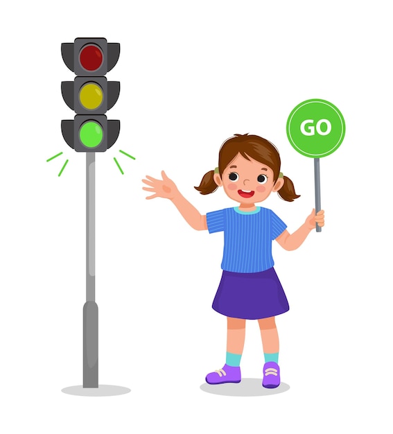 Menina bonitinha segurando a placa de sinal mostrando a luz verde do indicador de semáforo acesa