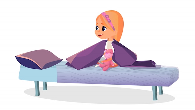 Menina dos desenhos animados de pijama com teddy na cama