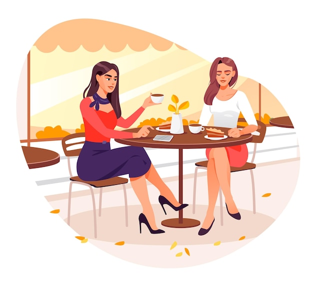 Meninas bebem café em uma cafeteria no outono. as meninas estão conversando enquanto estão sentadas no terraço