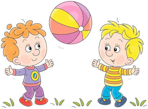 Meninos engraçados brincando alegremente com uma grande bola listrada em um playground em um parque