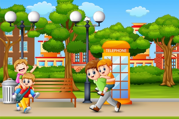 Meninos felizes brincando no parque da cidade