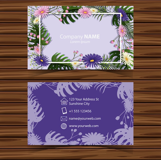 Vetor modelo businesscard com flores no fundo roxo