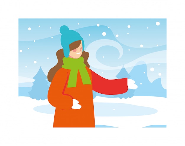 Mulher com roupas de inverno na paisagem com queda de neve