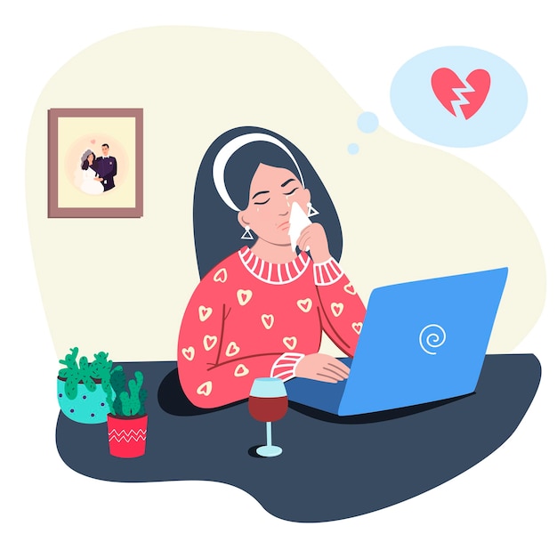 mulher triste com o coração partido na frente do computador