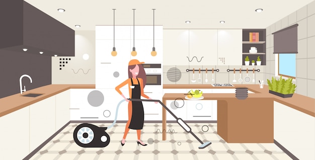 Mulher usando aspirador de pó feminino faxineiro em uniforme limpando o trabalho doméstico limpeza conceito de serviço cozinha moderna interior horizontal comprimento total esboço