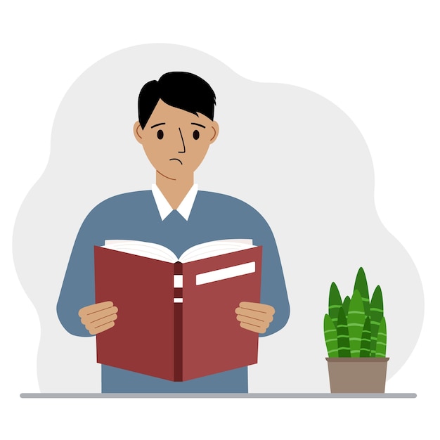 O homem está segurando um grande livro nas mãos