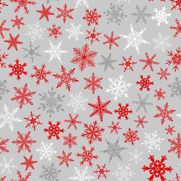 Padrão perfeito de Natal de flocos de neve vermelhos e brancos em fundo cinza