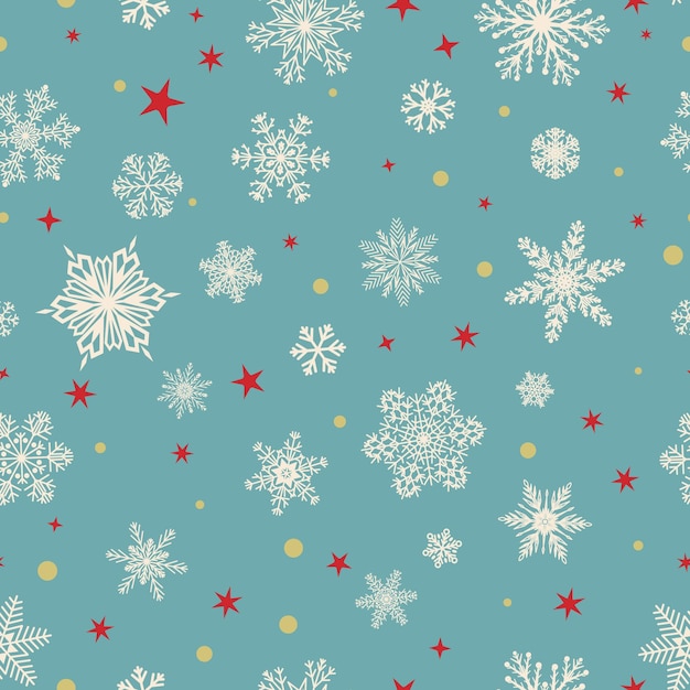 Padrão perfeito de natal de grandes e pequenos flocos de neve brancos sobre azul claro