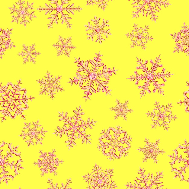 Padrão sem emenda de flocos de neve de natal complexos em cores vermelhas em fundo amarelo