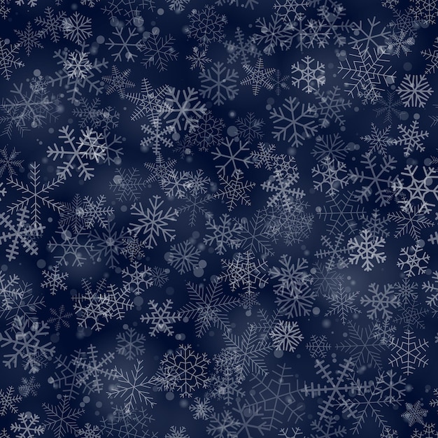 Padrão sem emenda de natal de flocos de neve de diferentes formas, tamanhos e transparência, em fundo azul escuro