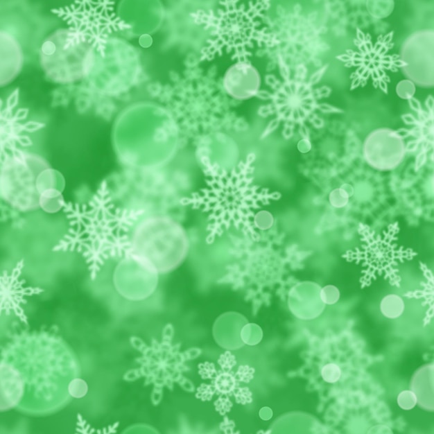 Padrão sem emenda de Natal de flocos de neve desfocados sobre fundo verde