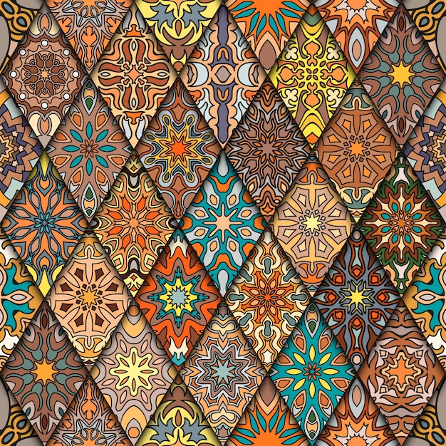 Padrão sem emenda do vintage colorido com elementos florais e da mandala. Fundo desenhado mão.