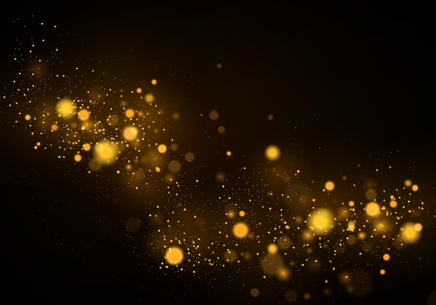 Partículas de pó amarelo ouro cintilantes mágicas. abstrato preto com efeito bokeh.