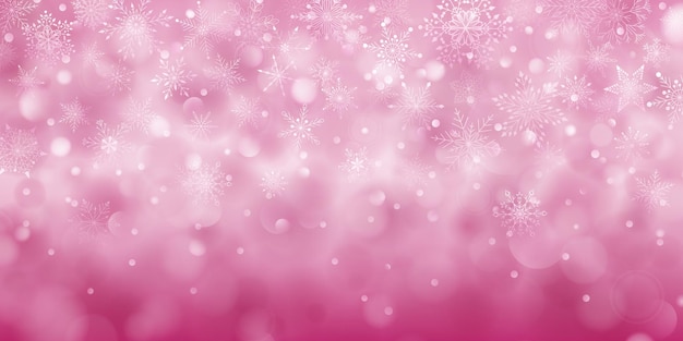 Plano de fundo de natal de complexos grandes e pequenos de flocos de neve caindo em cores rosa com efeito bokeh