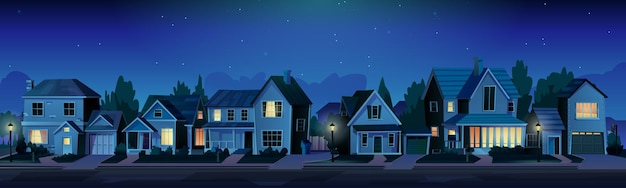 Rua com casas suburbanas com luzes à noite