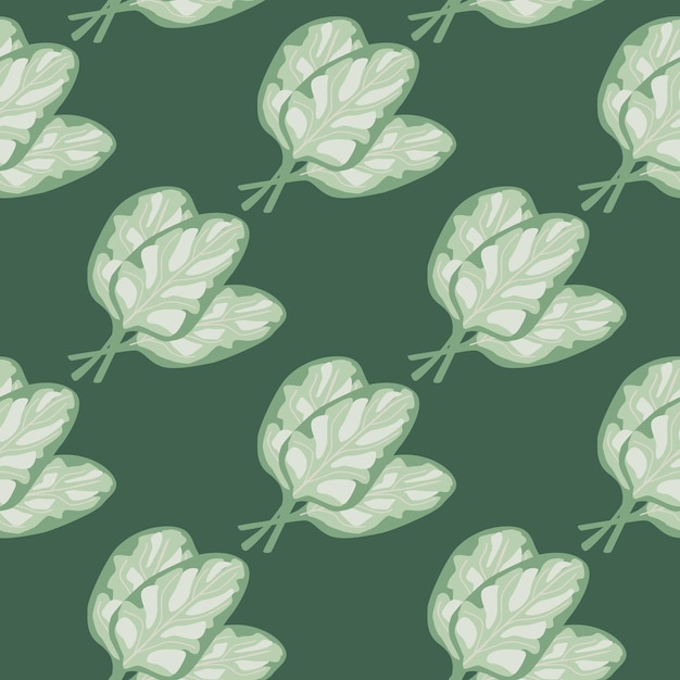 Salada de espinafre de grupo padrão sem emenda sobre fundo verde. ornamento abstrato com alface.