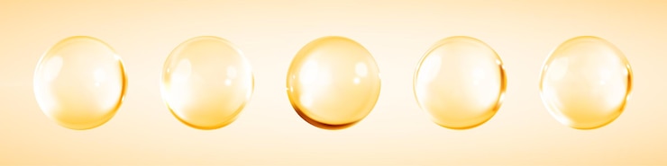 Vetor serum de colágeno ou gotas de essência isoladas em fundo amarelo bolhas douradas de serum de collágeno