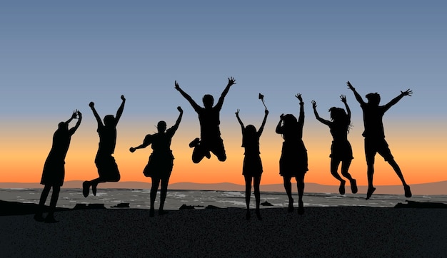 silhueta de um grupo de amigos pulando de alegria perto de uma praia durante o pôr do sol