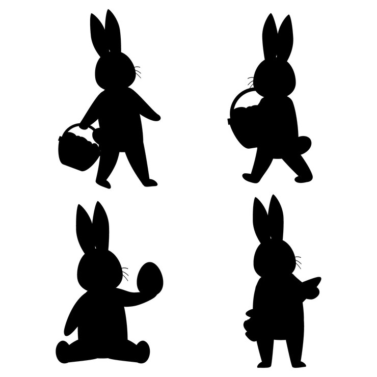 Vetor silhuetas de coelhos de páscoa em um fundo branco