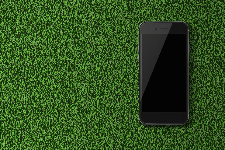 Vetor telefone inteligente com tela preta em fundo de grama verde.