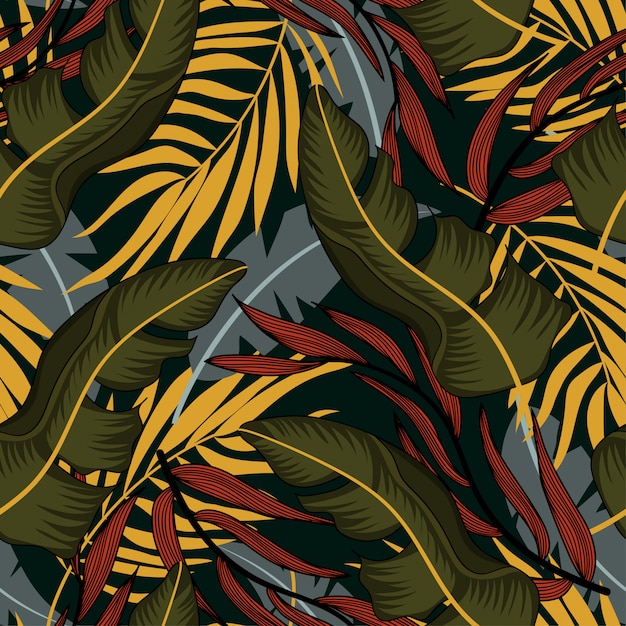 Tendência abstrata padrão sem emenda com folhas tropicais coloridas e plantas em fundo azul