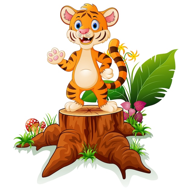 Tigre de bebê fofo posando em tronco de árvore