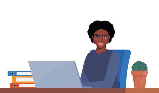 Trabalhadora de escritório mulher afro-americana de terno trabalhando em um computador portátil em seu escritório