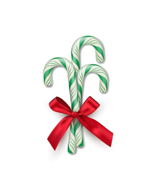 Vetor três bastões de doces listrados verdes com laço vermelho isolado no fundo branco elemento de design de natal