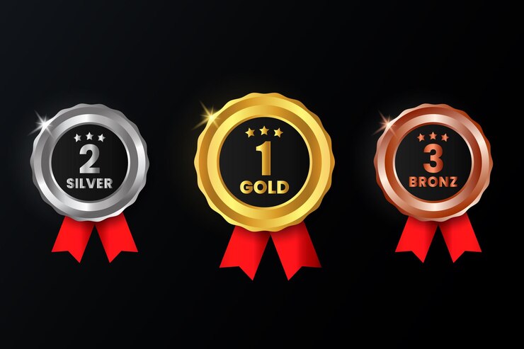Vetor um conjunto de quatro medalhas de ouro, prata e bronze