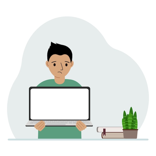Um garotinho está segurando um laptop nas mãos O conceito de aprendizado on-line fica em casa educação