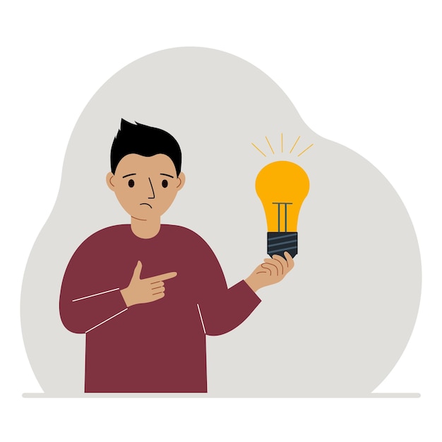 Um garotinho está segurando uma lâmpada na mão conceito de ideia brainstorming solução de pensamento eureka bingo dever de casa ou encontrar resposta