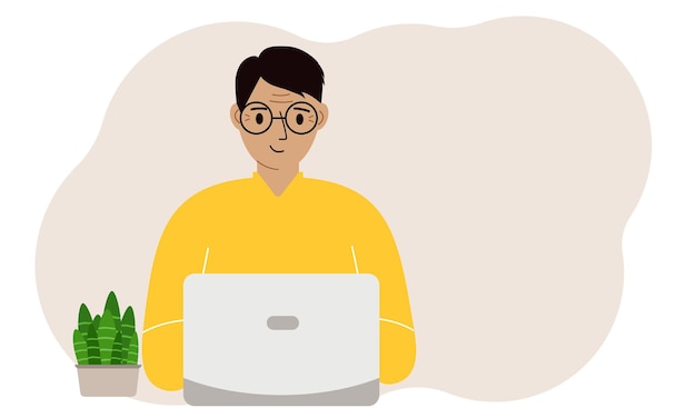 Um homem está trabalhando ou estudando em um laptop Freelancing ou ensino à distância e conceito de trabalho