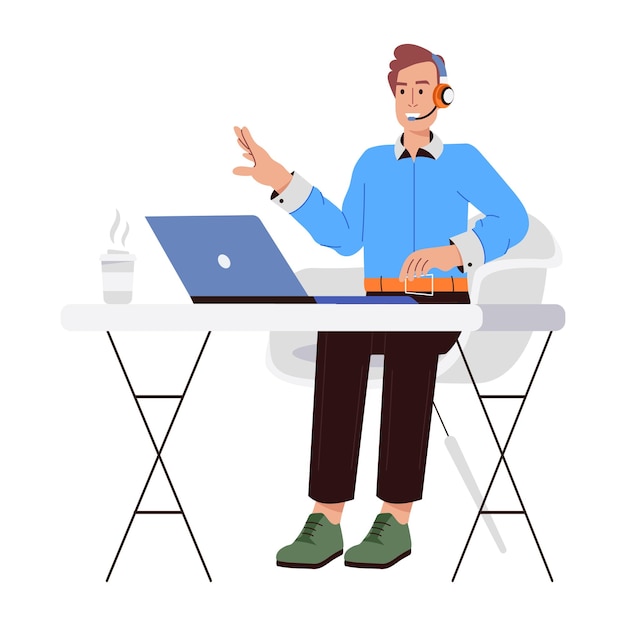 um homem senta-se em uma mesa com um laptop e um telefone na mão