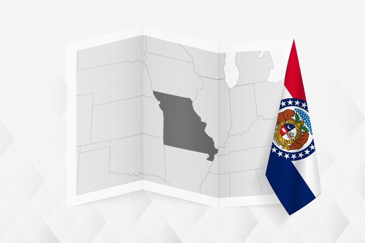Vetor um mapa em escala de cinza do missouri com uma bandeira do missouri pendurada de um lado