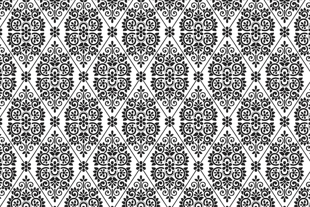 um padrão preto e branco com a imagem de um ornamento decorativo