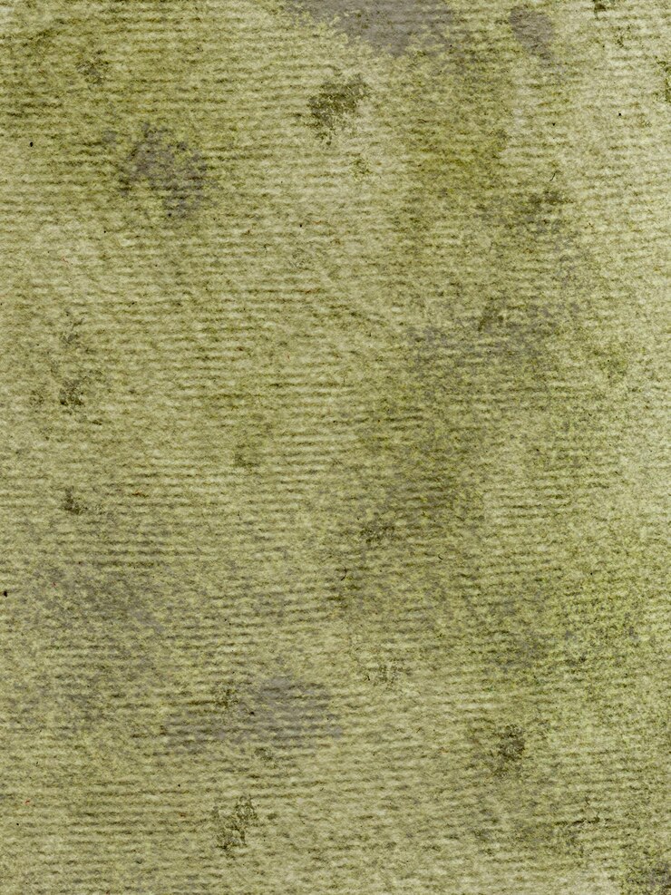 Vetor um pano verde com manchas pretas nele