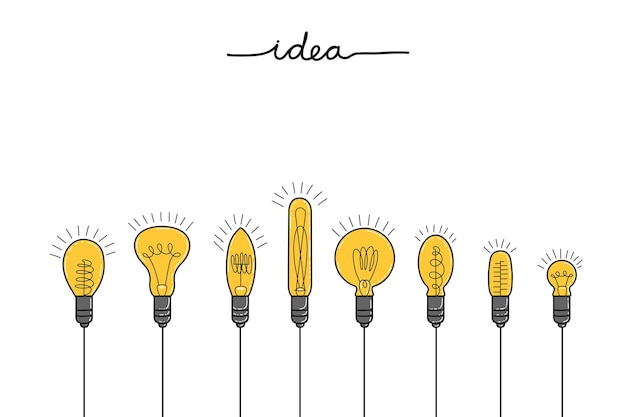 Uma coleção desenhada à mão de elementos de uma ideia, um brilhante, uma lâmpada como símbolo de uma ideia