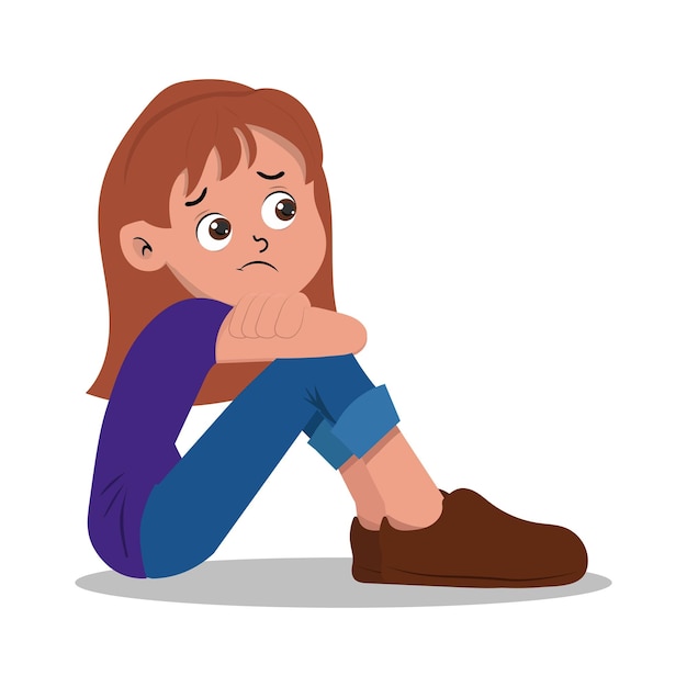 Uma garota com uma cara triste está sentada no chão.