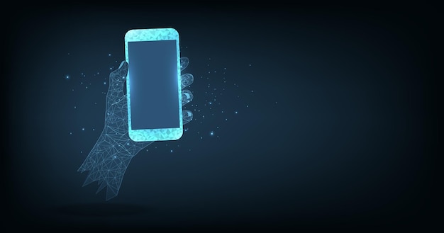 Uma mão segurando um smartphone em um fundo azul escuro