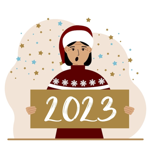 Uma mulher com um suéter vermelho e com um boné segura uma placa ou pôster com os números 2023 cartão postal ou saudação feliz natal e feliz ano novo