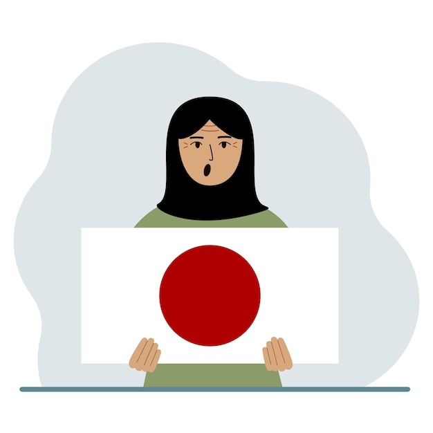 Uma mulher segura a bandeira do japão em suas mãos o conceito de feriado nacional de demonstração ou patriotismo nacionalidade