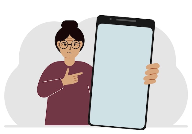 Vetor uma mulher segura uma maquete de um grande smartphone com uma tela em branco e com a segunda mão aponta para a tela do telefone ilustração plana vetorial