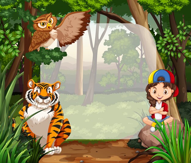 Bambina e animali selvatici nella giungla