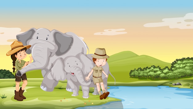 Bambini ed elefanti sul fiume