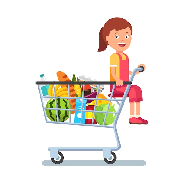 Bambino seduto in un carrello di shopping del supermercato