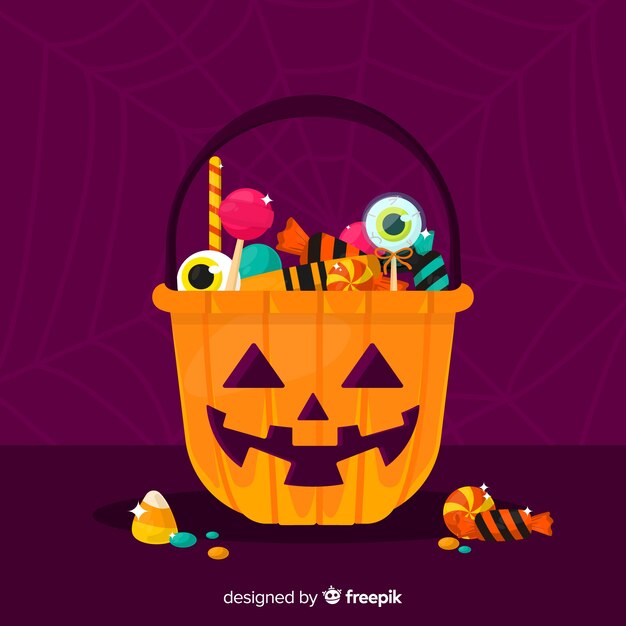 Composizione della parte posteriore della caramella di Halloween nel desing piano