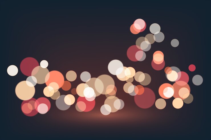 Vettore gratuito effetto delle luci bokeh sullo sfondo scuro