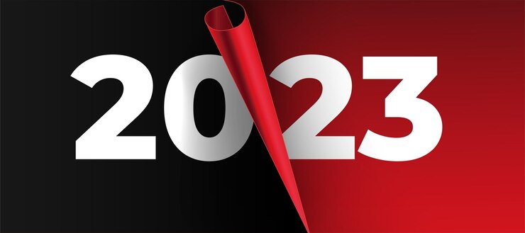 Vettore gratuito felice anno nuovo 2023 sfondo con papercut realistico