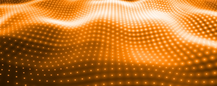 Vettore gratuito fondo astratto di vettore con le luci al neon arancioni che formano la superficie ondulata.
